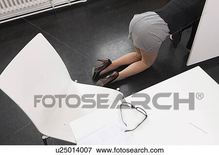 Businesswoman crawling on office floor View Large Photo Image Stock Photo - Businesswoman crawling on office floor. Fotosearch