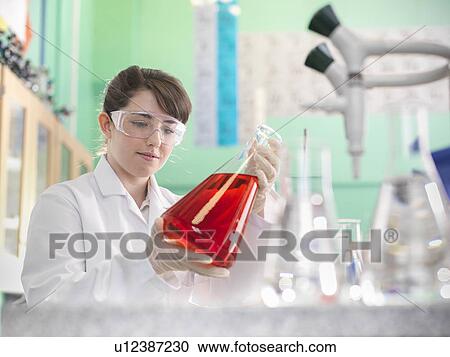 Chemistry student working in lab View Large Photo Image Stock Image - Chemistry student working in lab. Fotosearch