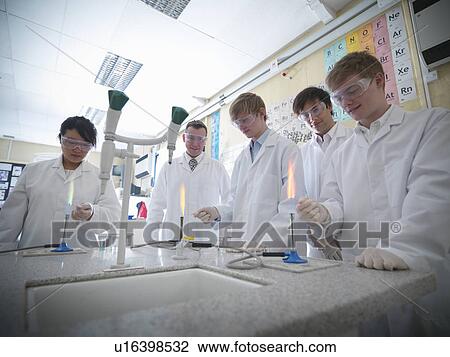 Chemistry teacher and students in lab View Large Photo Image Stock Image - Chemistry teacher and students in lab. Fotosearch