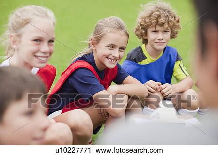 Children laughing during soccer practice View Large Photo Image Stock Image - Children laughing during soccer practice. Fotosearch