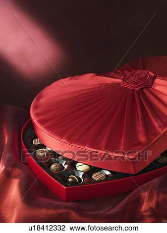 Stock Image - Chocolates in decorative box. Fotosearch