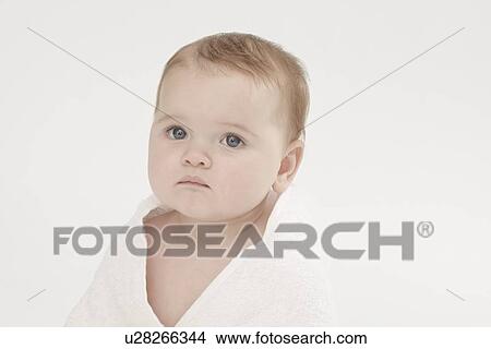 Close up of baby girl wearing bathrobe View Large Photo Image Picture - Close up of baby girl wearing bathrobe. Fotosearch