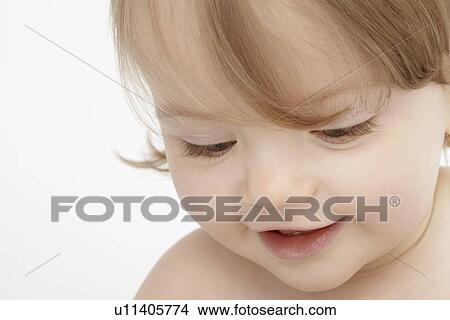 Close up of baby girls face View Large Photo Image Picture - Close up of baby girls face. Fotosearch