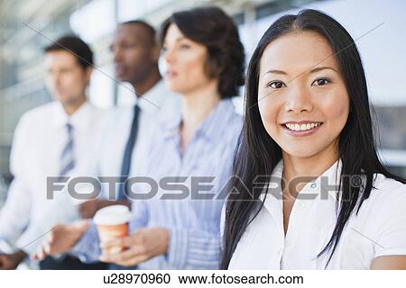 Close up of businesswomans smiling face View Large Photo Image Stock Image - Close up of businesswomans smiling face. Fotosearch