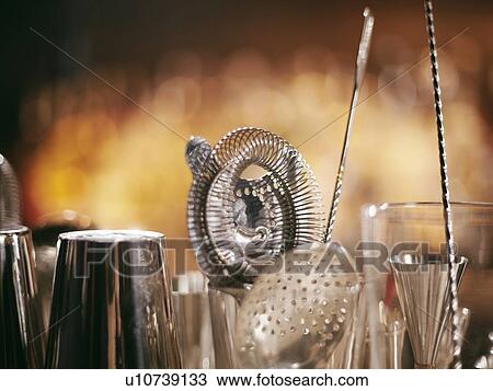Stock Image - Close up of cocktail making tools. Fotosearch