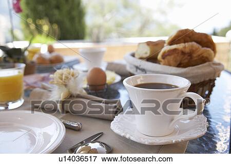 Close up of coffee at breakfast table View Large Photo Image Stock Photo - Close up of coffee at breakfast table. Fotosearch