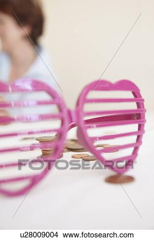 Close up of heart shaped sunglasses View Large Photo Image Picture - Close up of heart shaped sunglasses. Fotosearch