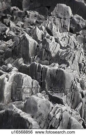 Close up of jagged rocks View Large Photo Image Stock Photograph - Close up of jagged rocks. Fotosearch