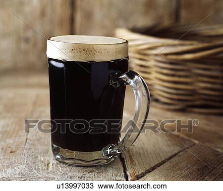 Close up of mug of beer View Large Photo Image Stock Image - Close up of mug of beer. Fotosearch