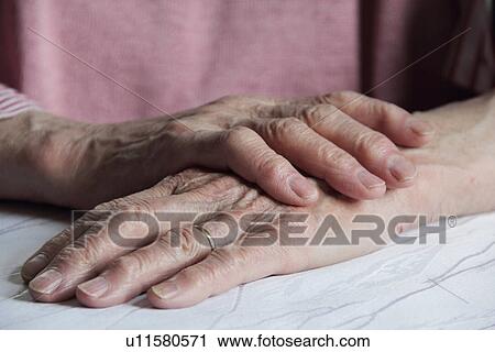 Close up of older womans hands View Large Photo Image Stock Image - Close up of older womans hands. Fotosearch