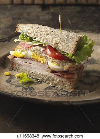 Close up of sandwich on plate View Large Photo Image Stock Photo - Close up of sandwich on plate. Fotosearch