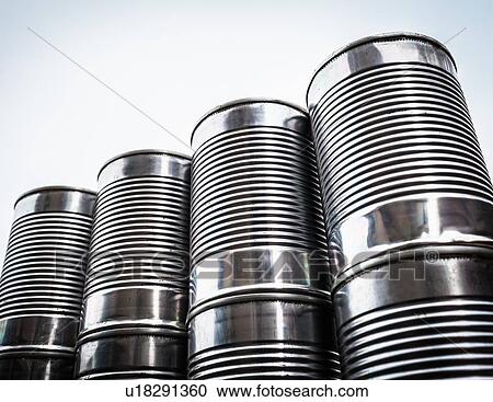 Stock Image - Close up of stacked aluminum cans. Fotosearch