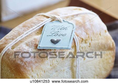 Close up of tag on fresh baked bread View Large Photo Image Stock Image - Close up of tag on fresh baked bread. Fotosearch