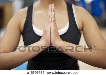 Close up of womans clasped hands View Large Photo Image Stock Photography - Close up of womans clasped hands. Fotosearch