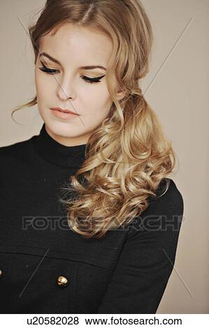 Close up of womans serious face View Large Photo Image Stock Photo - Close up of womans serious face. Fotosearch