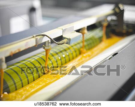 Close up of yellow ink in printing press View Large Photo Image Stock Image - Close up of yellow ink in printing press. Fotosearch