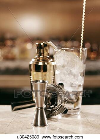 Stock Photo - Cocktail making tools on bar. Fotosearch