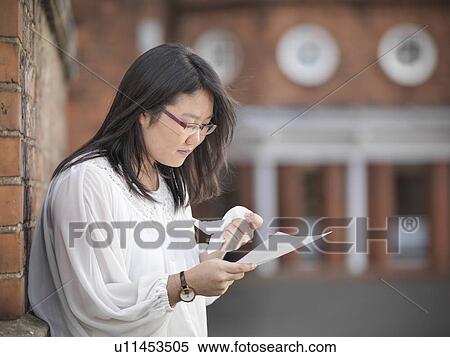 Crying student reading grades at school View Large Photo Image Stock Photography - Crying student reading grades at school. Fotosearch