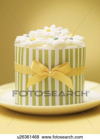 Stock Photo - Decorated cookies in ornate tin. Fotosearch