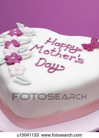 Stock Image - Decorated Mothers Day cake. Fotosearch