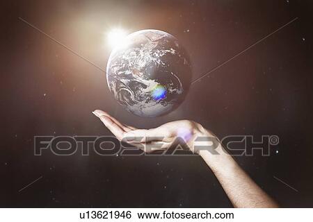 Hand holding image of the Earth View Large Photo Image Stock Photograph - Hand holding image of the Earth. Fotosearch