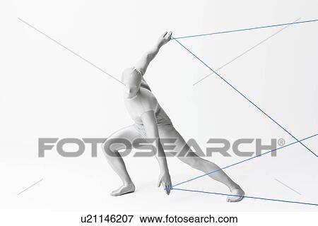 Stock Photo - Man in bodysuit playing with string. Fotosearch