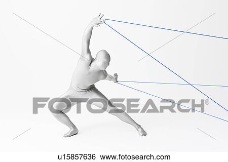 Man in bodysuit playing with string View Large Photo Image Stock Photograph - Man in bodysuit playing with string. Fotosearch