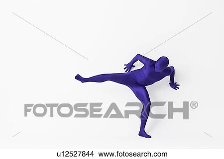 Picture - Man in bodysuit posing. Fotosearch