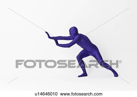 Stock Image - Man in bodysuit posing. Fotosearch