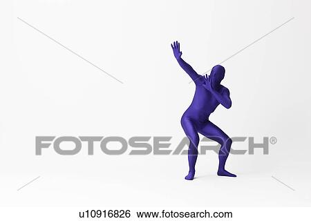 Stock Photograph - Man in bodysuit posing. Fotosearch