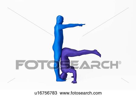 Stock Image - Men in bodysuits making the letter F. Fotosearch