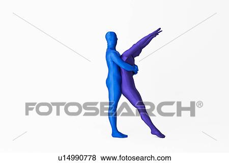 Stock Photo - Men in bodysuits making the letter K. Fotosearch