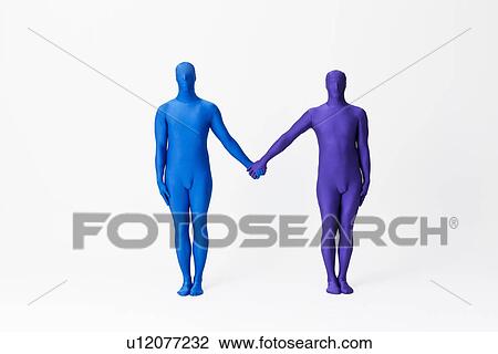 Stock Image - Men in bodysuits making the letter M. Fotosearch
