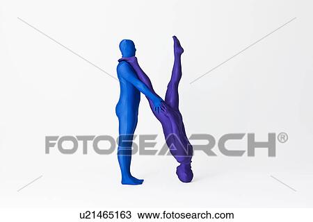 Stock Image - Men in bodysuits making the letter N. Fotosearch