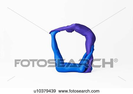 Men in bodysuits making the letter O View Large Photo Image Stock Photo - Men in bodysuits making the letter O. Fotosearch