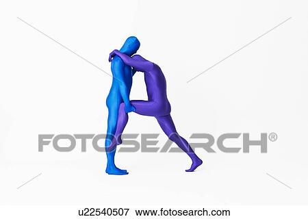 Men in bodysuits making the letter R View Large Photo Image Stock Photo - Men in bodysuits making the letter R. Fotosearch