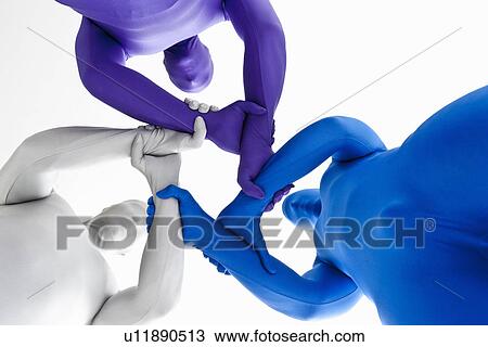 Stock Image - Men in bodysuits posing together. Fotosearch