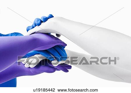 Stock Image - Men in bodysuits posing together. Fotosearch