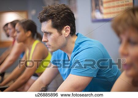 People using spin machines in gym View Large Photo Image Stock Photograph - People using spin machines in gym. Fotosearch