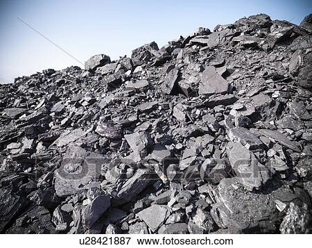 Piles of coal at mine View Large Photo Image Stock Photo - Piles of coal at mine. Fotosearch