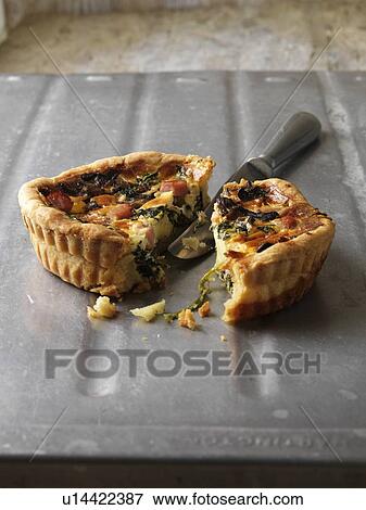 Stock Photo - Quiche on metal tray. Fotosearch