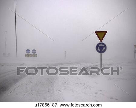 Road signs in snowy landscape View Large Photo Image Stock Photo - Road signs in snowy landscape. Fotosearch