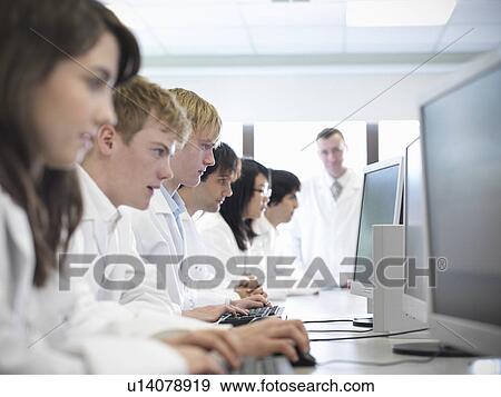 Stock Photo - Science students working on computers. Fotosearch