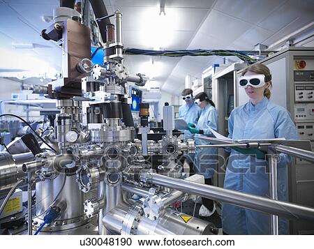 Scientist using vacuum chamber in lab View Large Photo Image Stock Image - Scientist using vacuum chamber in lab. Fotosearch