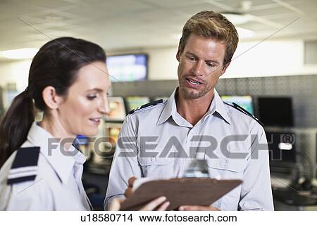 Security personnel in control room View Large Photo Image Picture - Security personnel in control room. Fotosearch