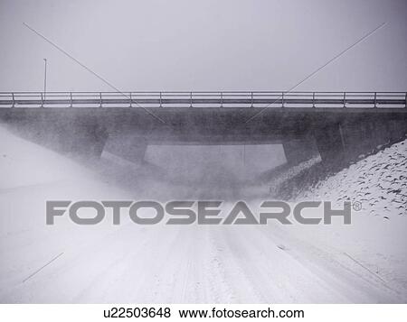 Snowy overpass in rural landscape View Large Photo Image Stock Photo - Snowy overpass in rural landscape. Fotosearch