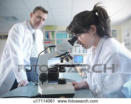 Student using microscope in classroom View Large Photo Image Stock Image - Student using microscope in classroom. Fotosearch