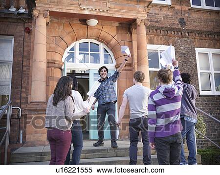 Students with grades cheering at school View Large Photo Image Stock Photography - Students with grades cheering at school. Fotosearch