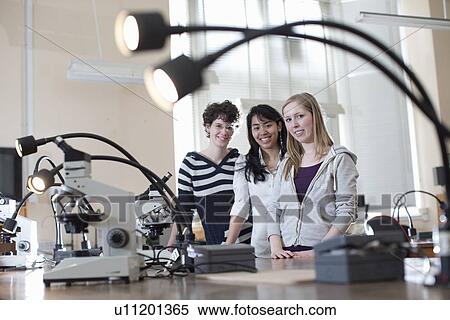 Stock Photography - Students working in geology lab. Fotosearch