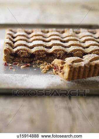 Stock Photo - Tray of baked fruit tart. Fotosearch
